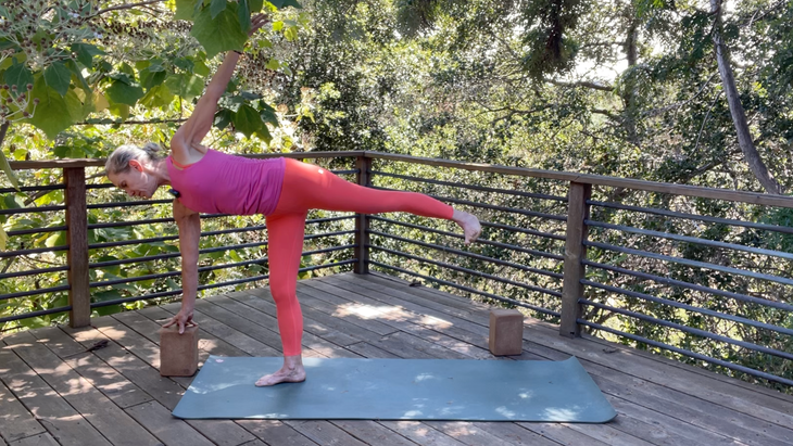 Yoga teacher Andrea Marcum in Half Moon Pose