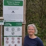 Christine Roberts, Huron Bruce Nature President, at the entrance to the George G Newton Nature Reserve